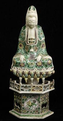 Appraisal: FAMILLE VERTE POLYCHROME BISQUE FIGURE OF KWAN YIN ON LOTUS