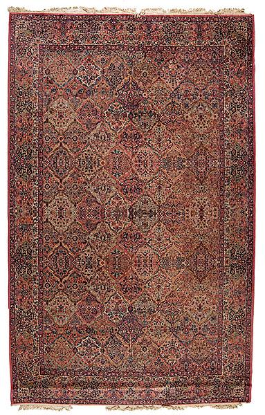 Appraisal: KARASTAN CARPET machine-made mid- th century on tan ground with