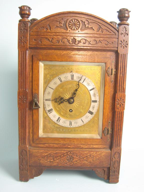 Appraisal: A th Century Aesthetic Movement oak cased Bracket Clock with