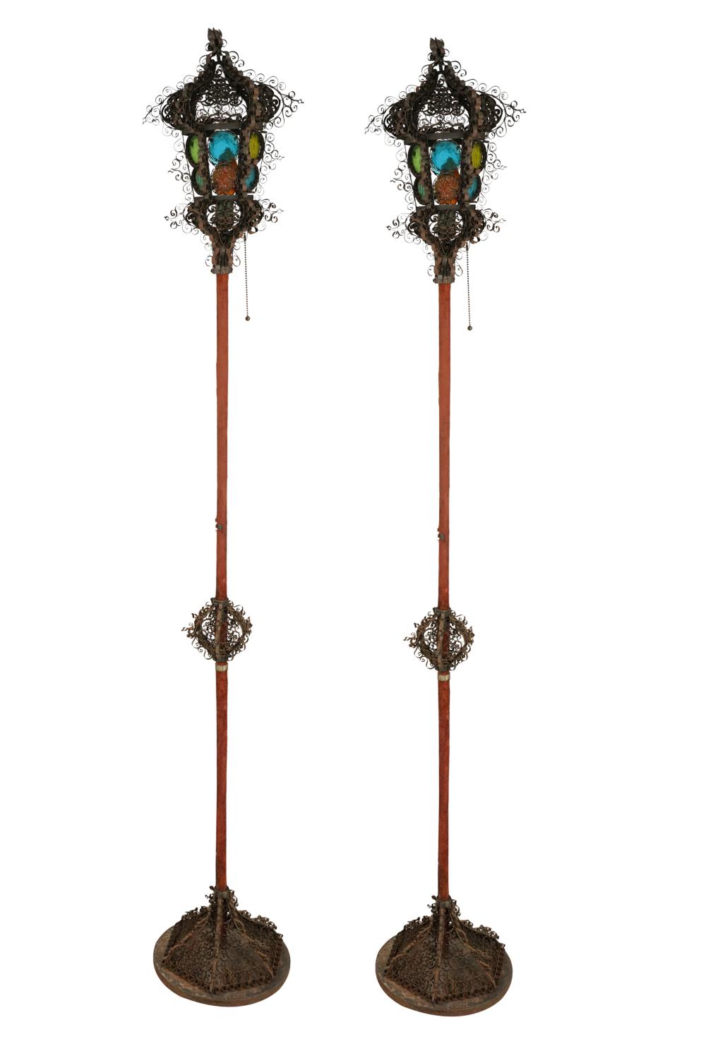 Appraisal: PAIR OF SPANISH STYLE STANDARDSeach with a metal filigree lantern