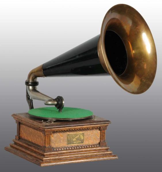 Appraisal: Class M Victor Phonograph with Horn Description Refinished Oak Includes