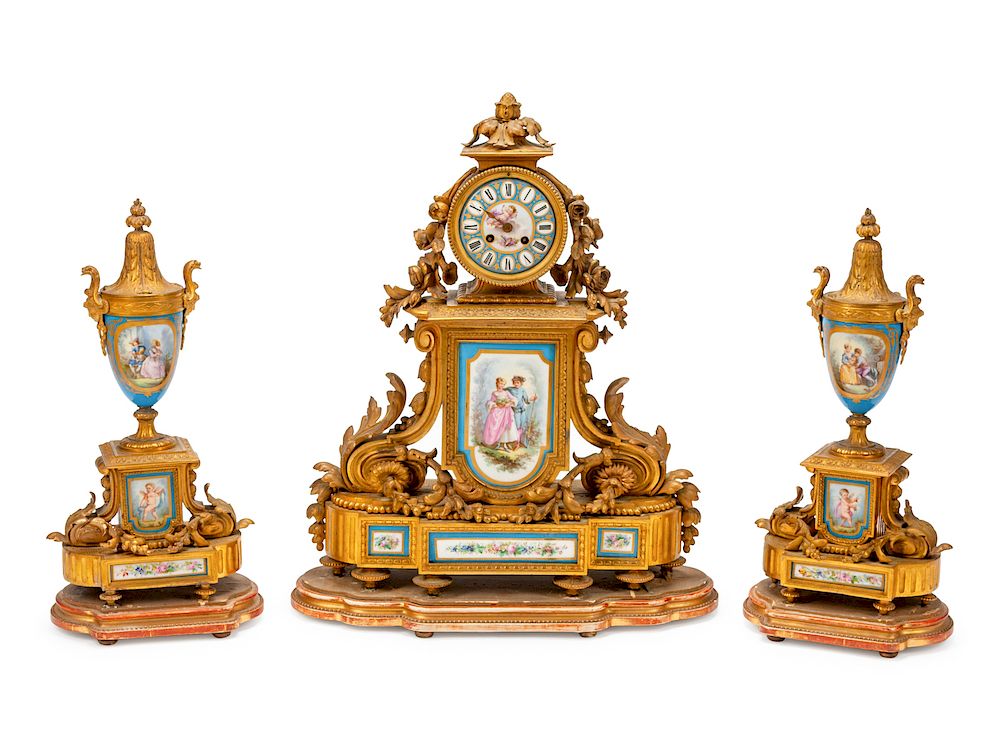 Appraisal: A French Gilt Bronze and Sevres Style Porcelain Clock Garniture