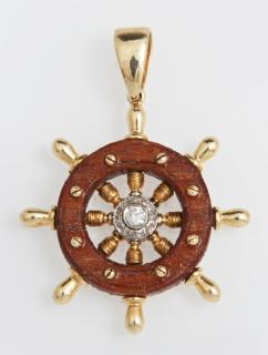 Appraisal: K Yellow Gold and Teak Ship's Wheel Pendant t K