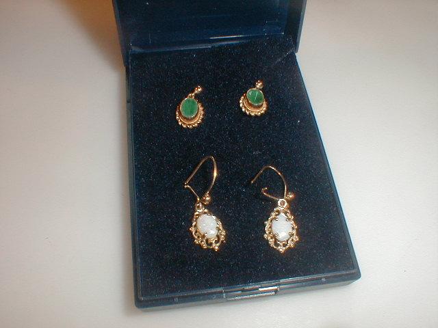 Appraisal: A pair of oval green stone set earrings and a