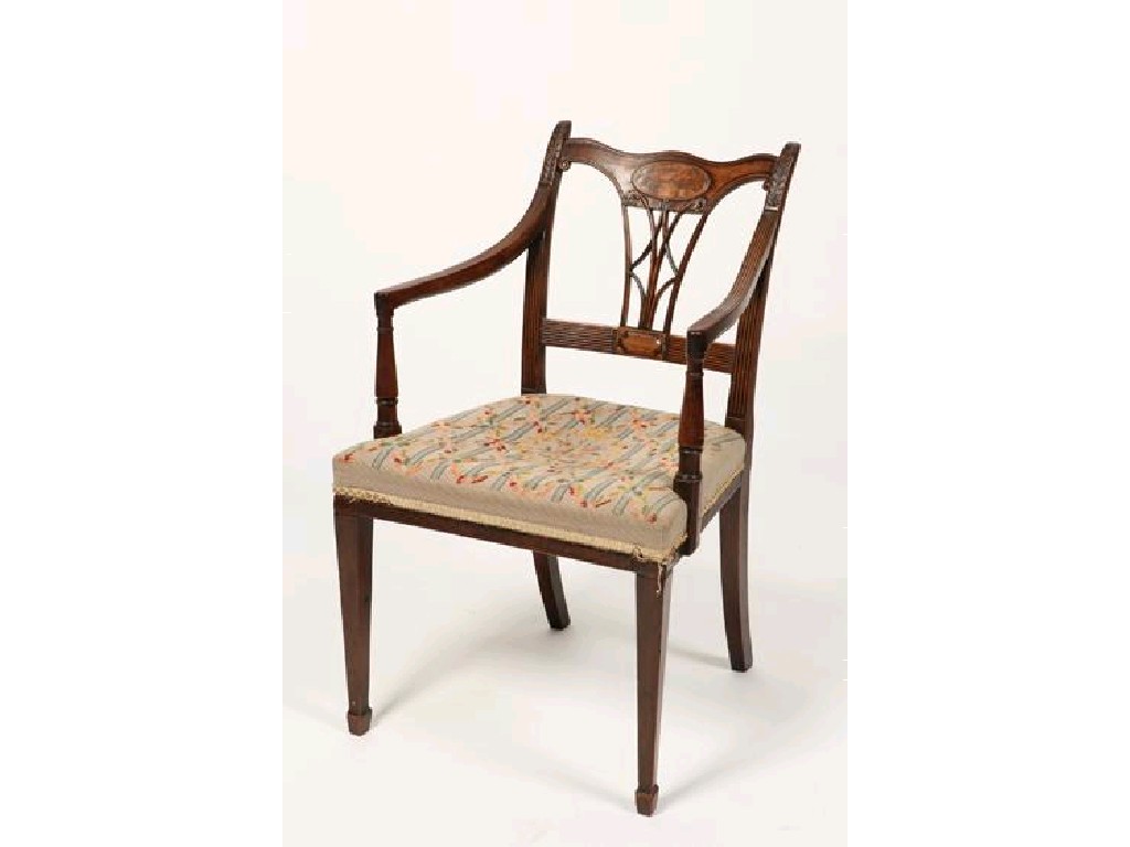 Appraisal: A GEORGE III SHERATON STYLE MAHOGANY ELBOW CHAIR the wavy