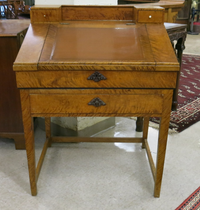 Appraisal: SLANT-TOP SATIN MAPLE DESK ON STAND th century the lift