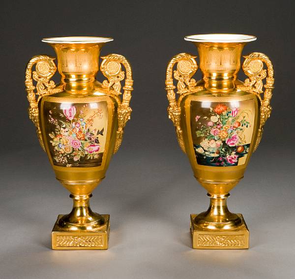 Appraisal: A pair of Neoclassical style polychrome and gilt porcelain urns