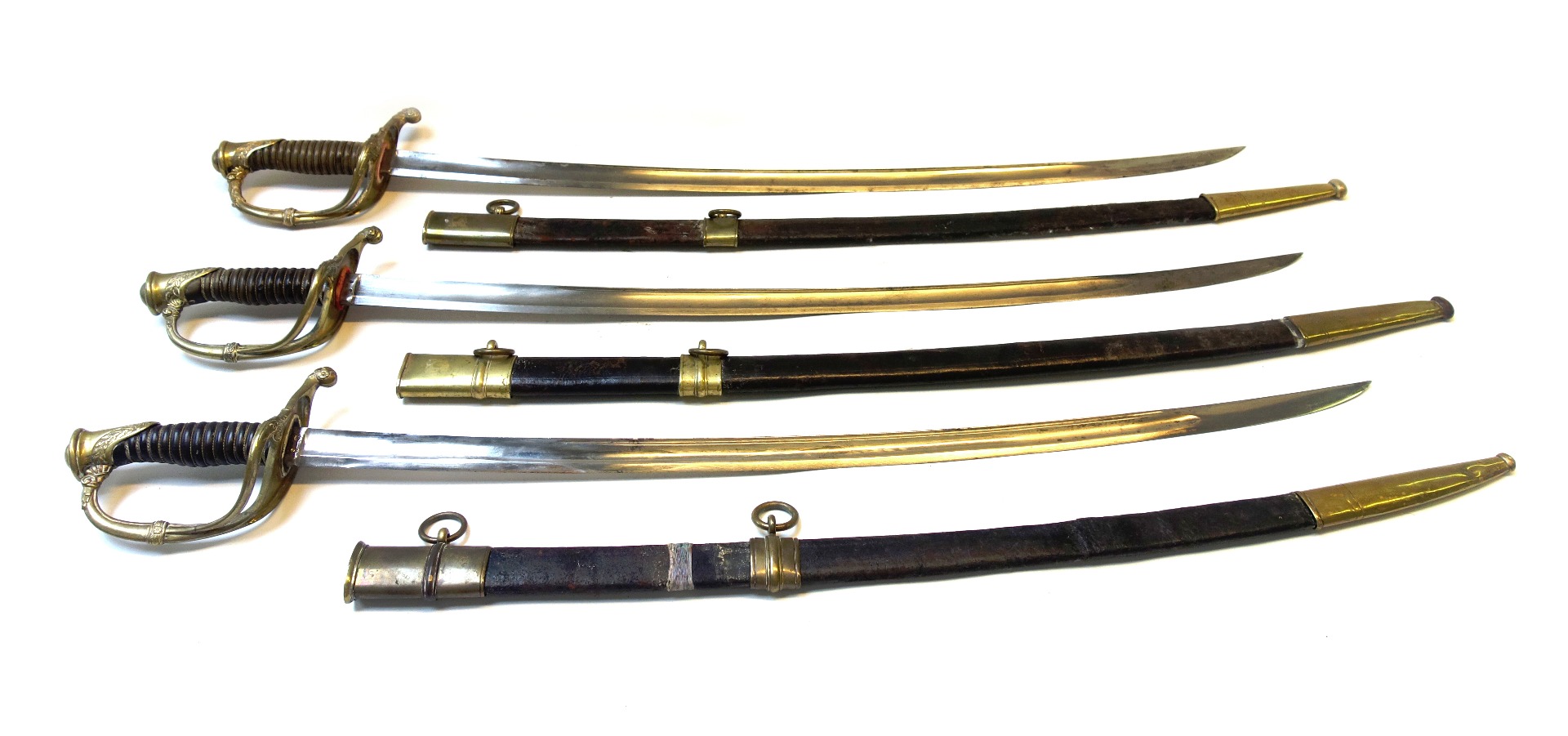 Appraisal: Three French cavalry sabres early th century each with curved