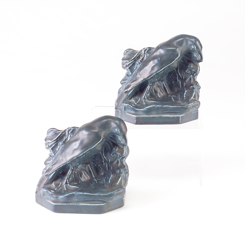 Appraisal: ROOKWOOD Pair of Rook bookends designed by William McDonald in