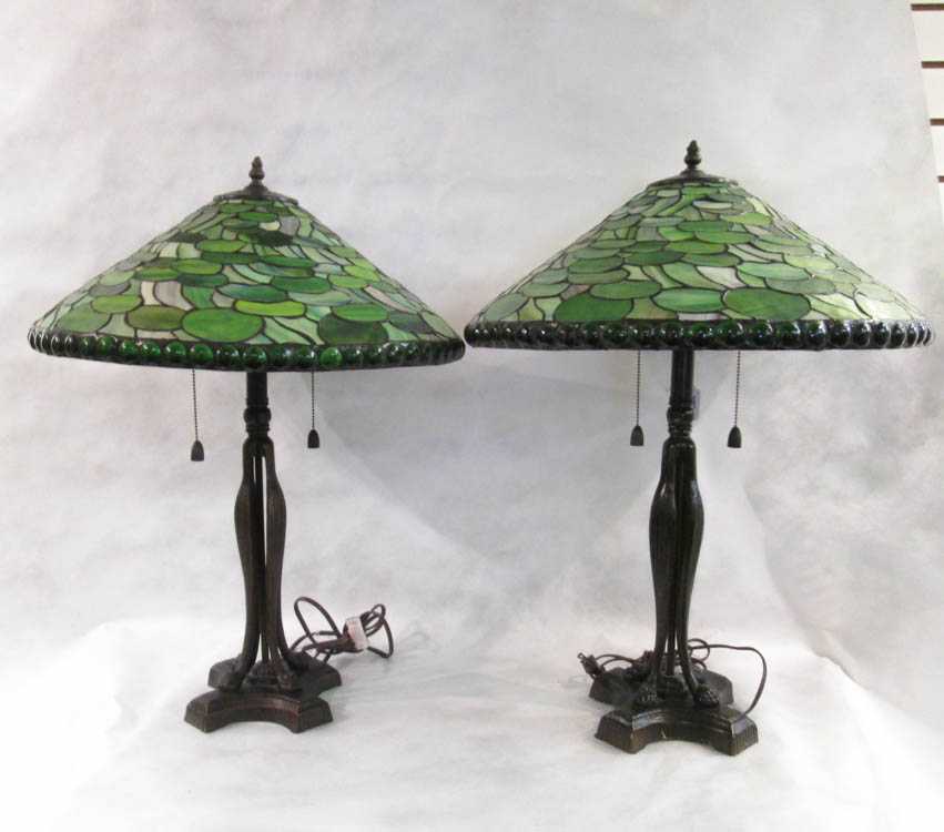 Appraisal: PAIR STAINED AND LEADED GLASS TABLE LAMPS with matching shades