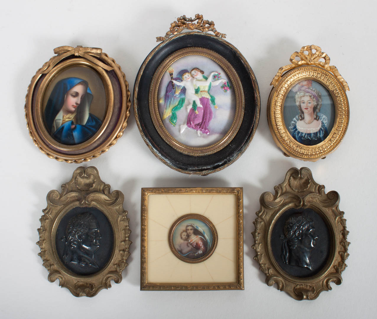 Appraisal: Six portrait miniatures and plaques th century Continental painted miniature