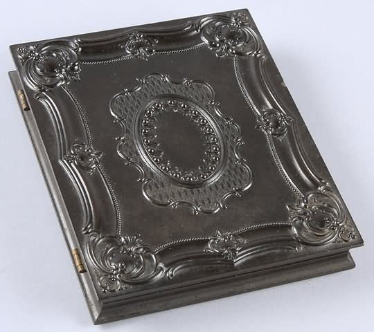 Appraisal: Half plate union case Geometric Scroll Krainik- Case contains ambrotype