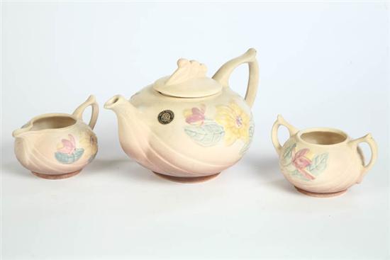 Appraisal: HULL POTTERY TEA SERVICE Pink to yellow in the Magnolia