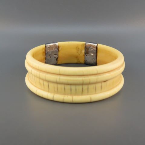 Appraisal: Ivory Sterling Silver Bracelet banded barrel design African opening circa