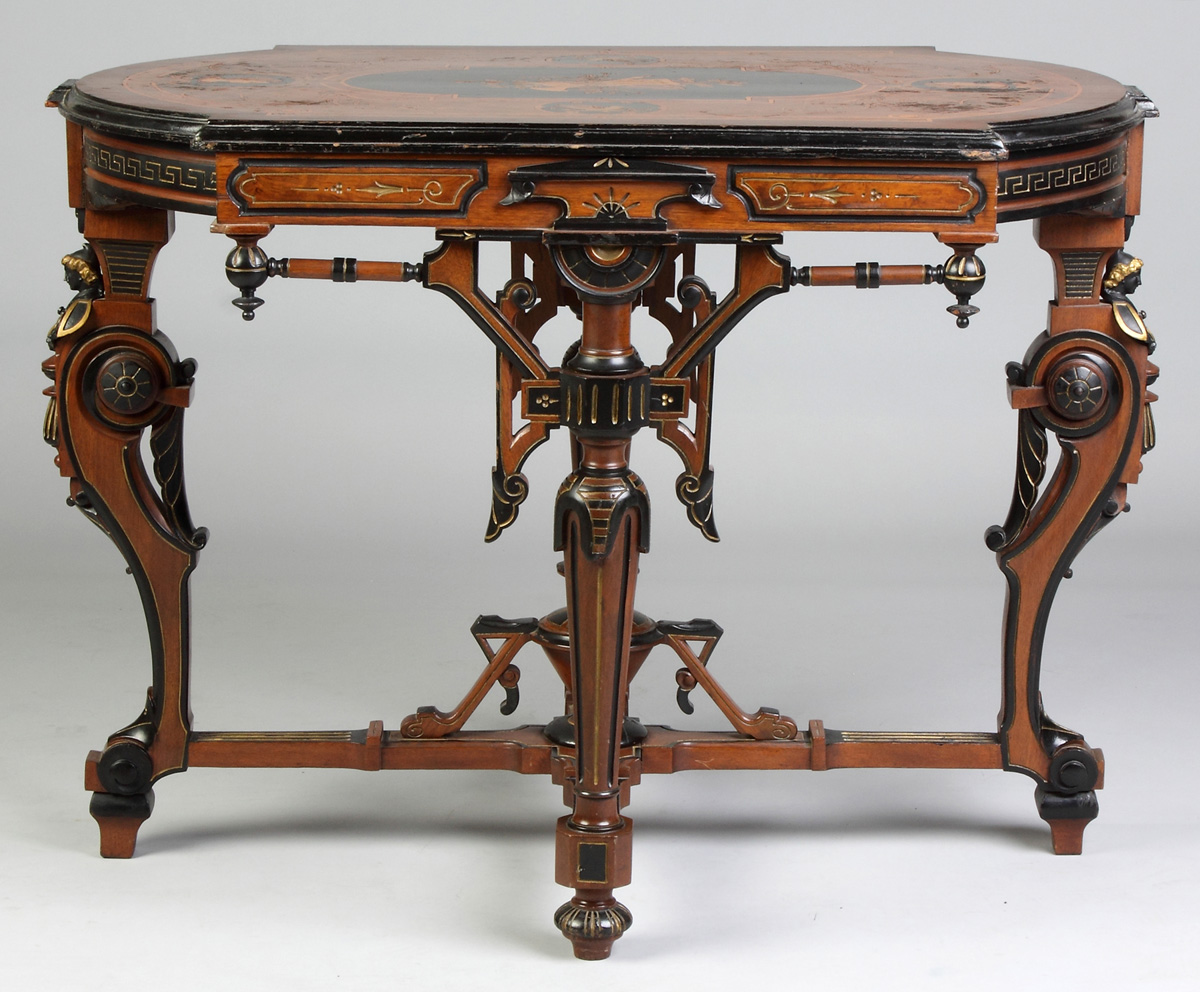 Appraisal: Victorian Inlaid Center Table th cent Ebonized w figural brass