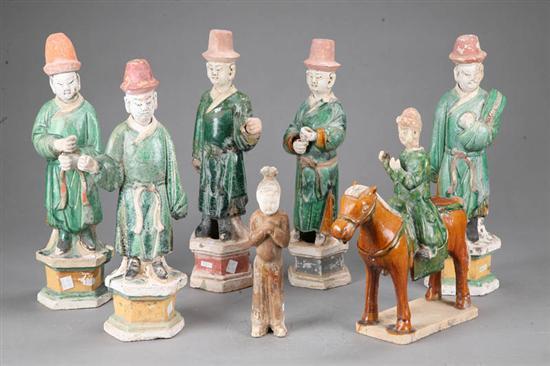 Appraisal: SEVEN POTTERY FIGURES Asian figures of men with removable heads