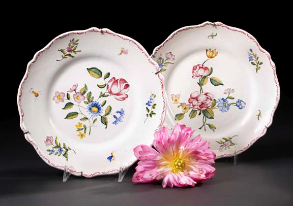 Appraisal: Pair of French Faience Dinner Plates in floral decor Rowen