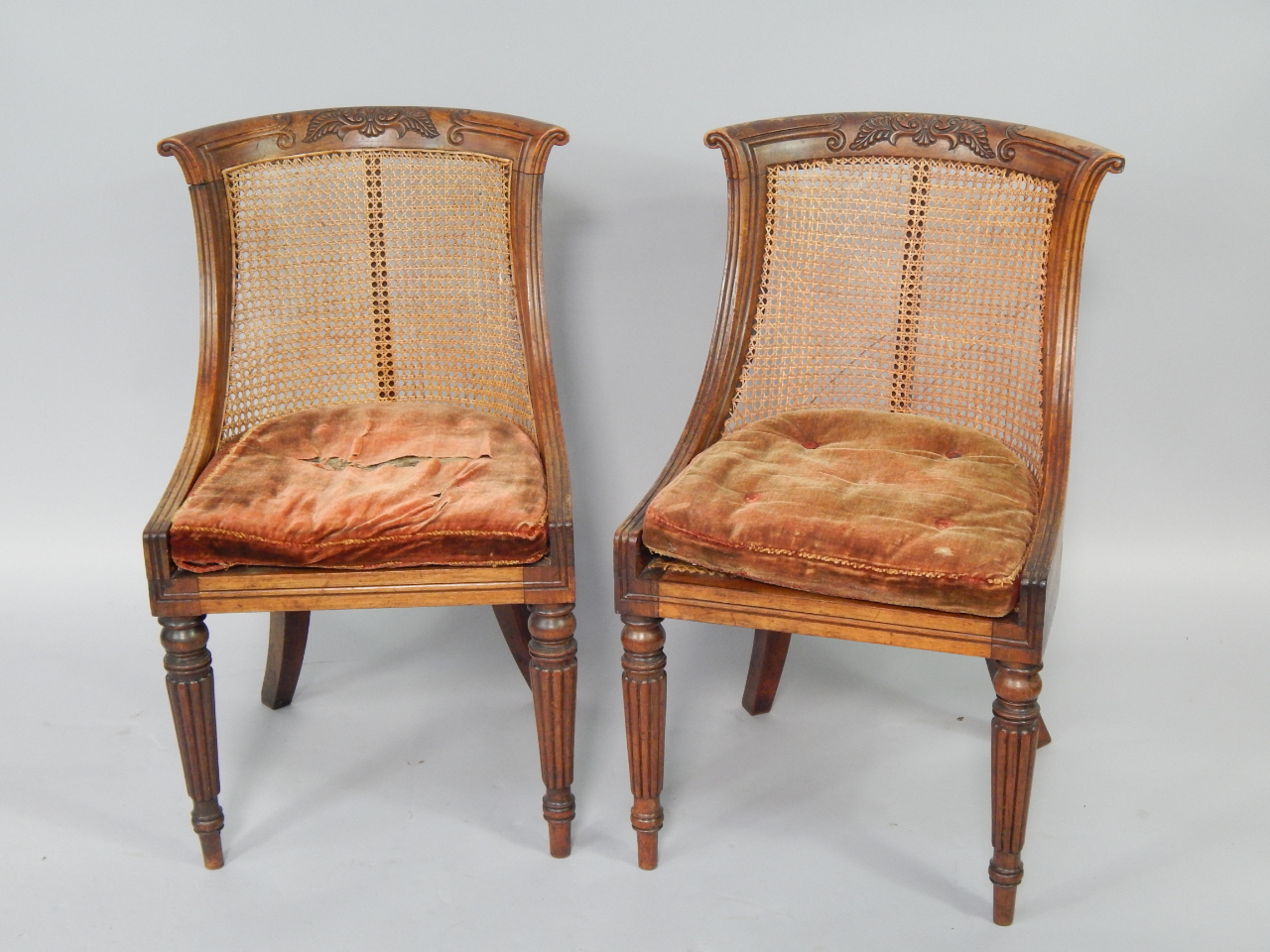 Appraisal: A pair of William IV rosewood chairs with carved crest