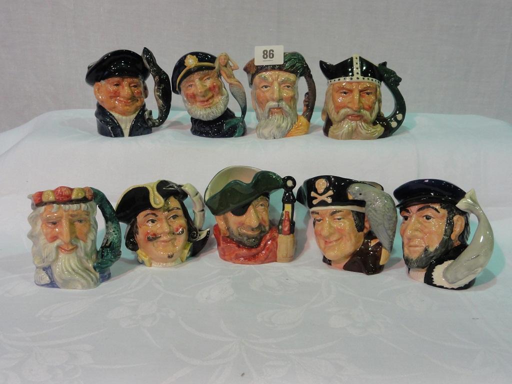 Appraisal: A collection of nine medium Royal Doulton Character Jugs of