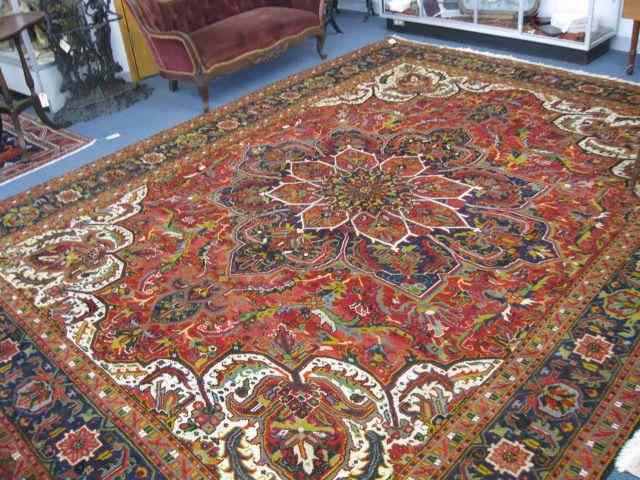 Appraisal: Heriz Persian Handmade Room Size Rug grand central medallion elaborate