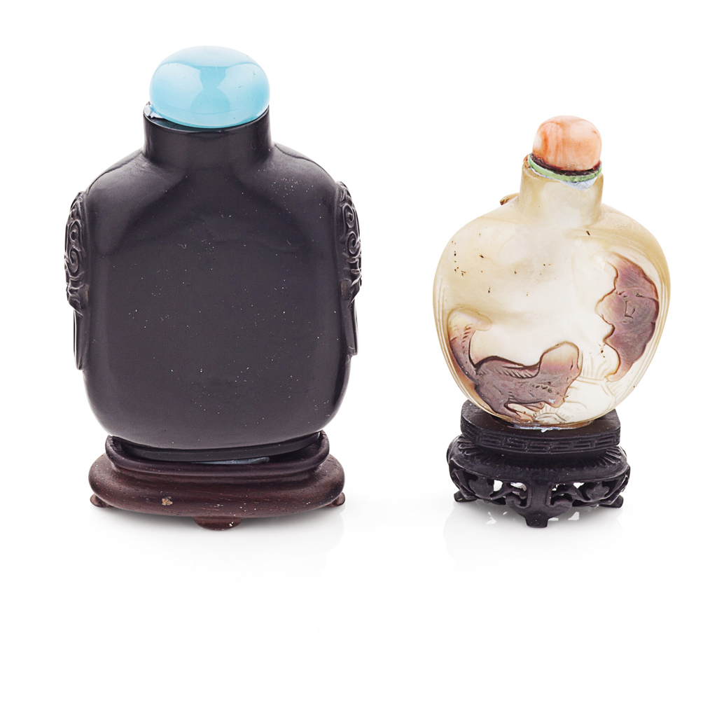 Appraisal: TWO SNUFF BOTTLES comprising a jet flattened rectangular bottle with