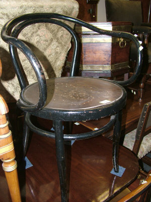 Appraisal: A black painted bentwood open armchair stamped 'J J Kohn