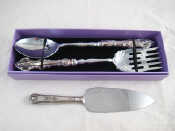 Appraisal: A boxed pair of salad servers unused handles marked together