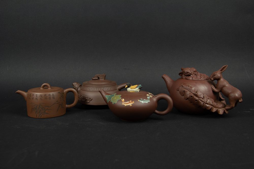 Appraisal: Group of Four Yixing Teapots RETURNED TO AUCTION DUE TO