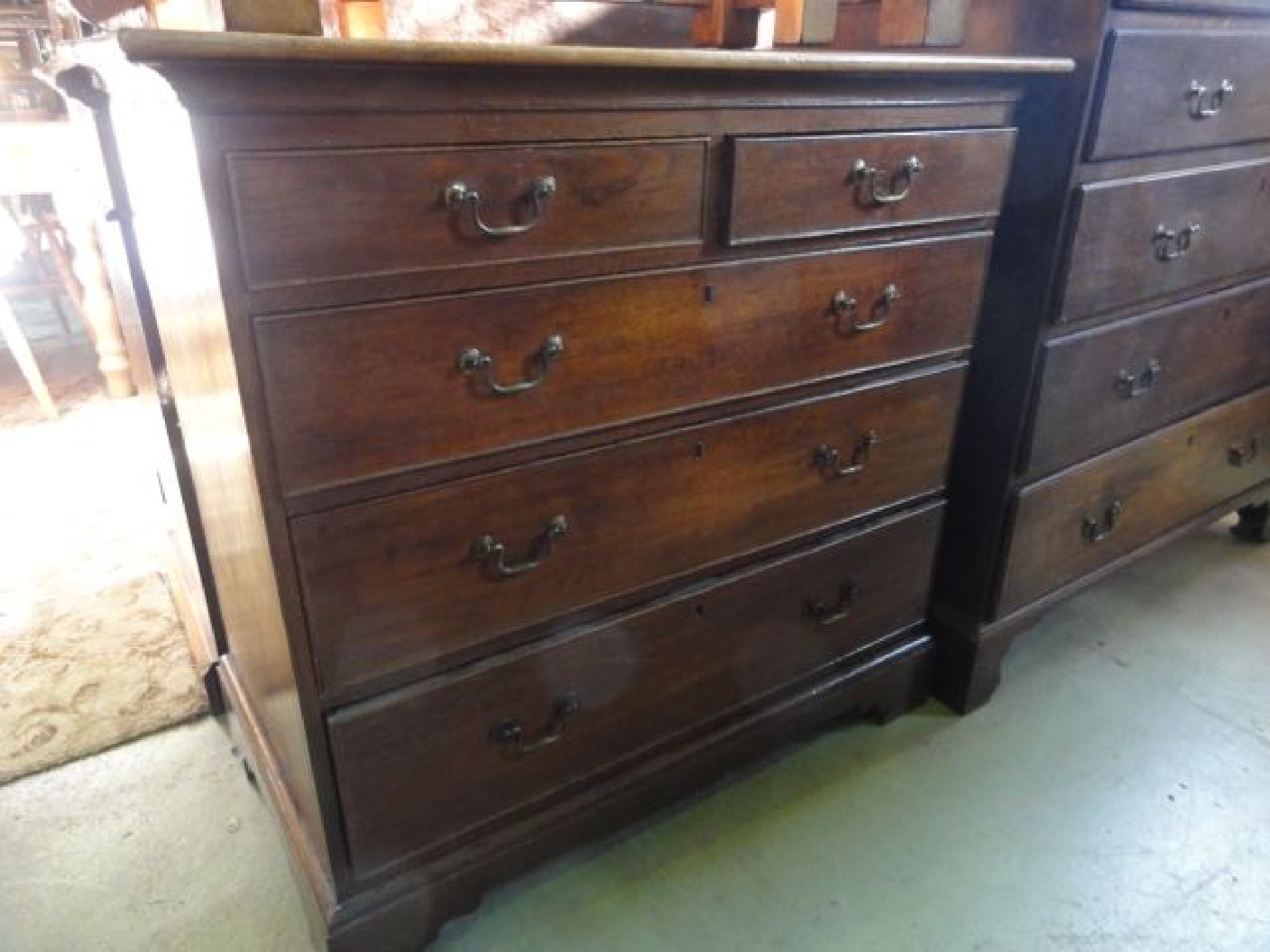 Appraisal: A Georgian oak bedroom chest of three long and two