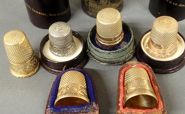 Appraisal: - Five gold thimbles in individual leather cases- marked l