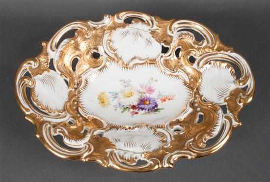 Appraisal: Meissen porcelain molded parcel-gilt and floral painted reticulated basket early