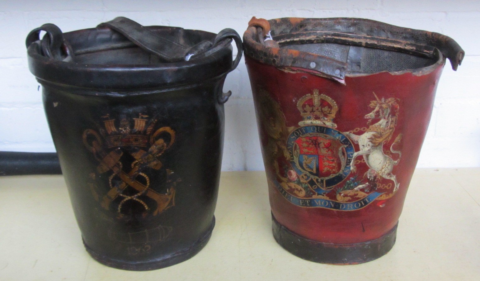 Appraisal: A leather fire bucket gilt decorated with a naval crest