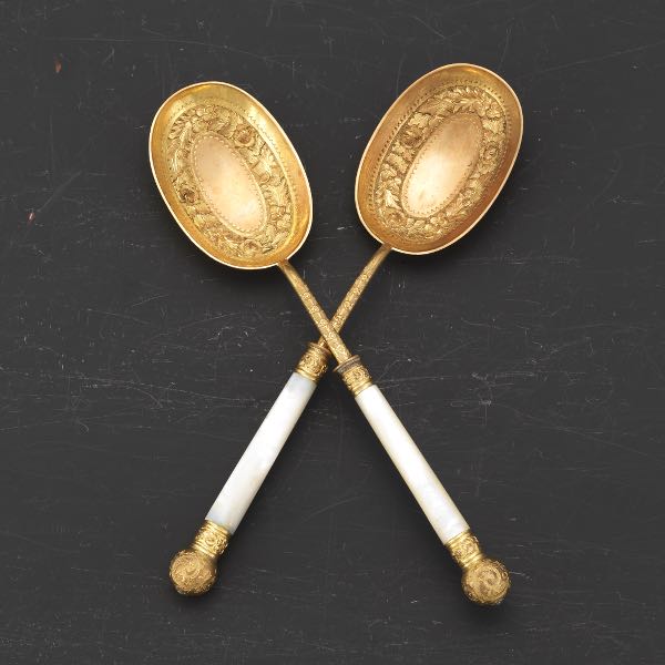 Appraisal: VICTORIAN D'ORE BRONZE AND MOTHER-OF-PEARL PAIR OF SERVING SPOONS BY