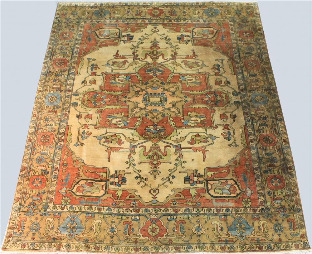 Appraisal: SERAPI STYLE ROOM SIZED WOOL RUG having a central medallion