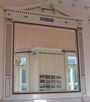 Appraisal: A mid th Century overmantel mirror with broken arch pediment