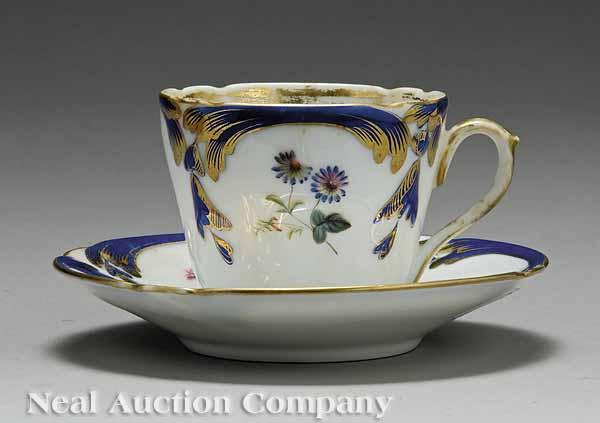 Appraisal: A Paris Porcelain Polychrome and Gilt-Decorated Cup and Saucer mid-