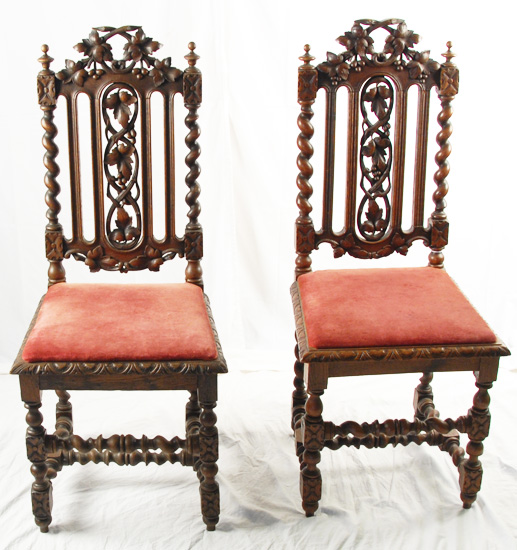 Appraisal: A Pair of Jacobean-style Side Chairs oak with heavily carved