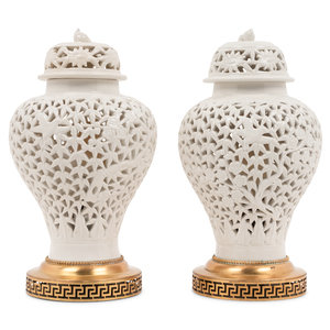 Appraisal: A Pair of White-Glazed Pierced Porcelain Jars Mounted as Lamps