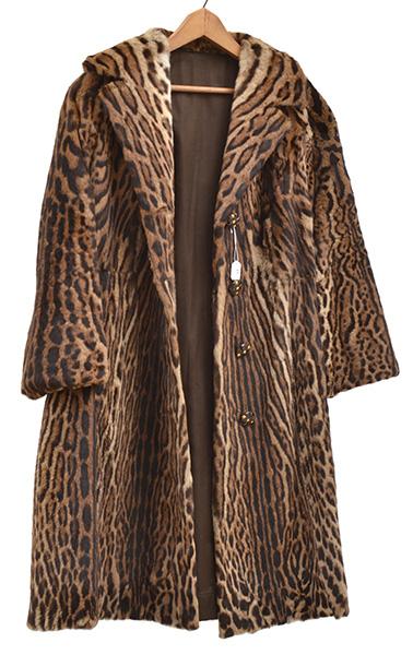 Appraisal: AN OCELOT COAT BY THEODORE FURS Labelled 'Theodore Furs Melbourne'