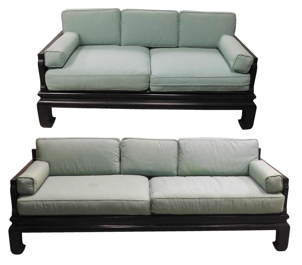 Appraisal: Chinese style sofa and love seat with ebonized frames and