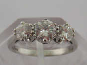 Appraisal: A three stone diamond ring the three graduated brilliants totalling