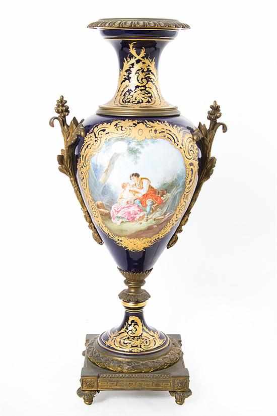 Appraisal: Sevres ormolu-mounted porcelain urn th century ornate country landscape scenic