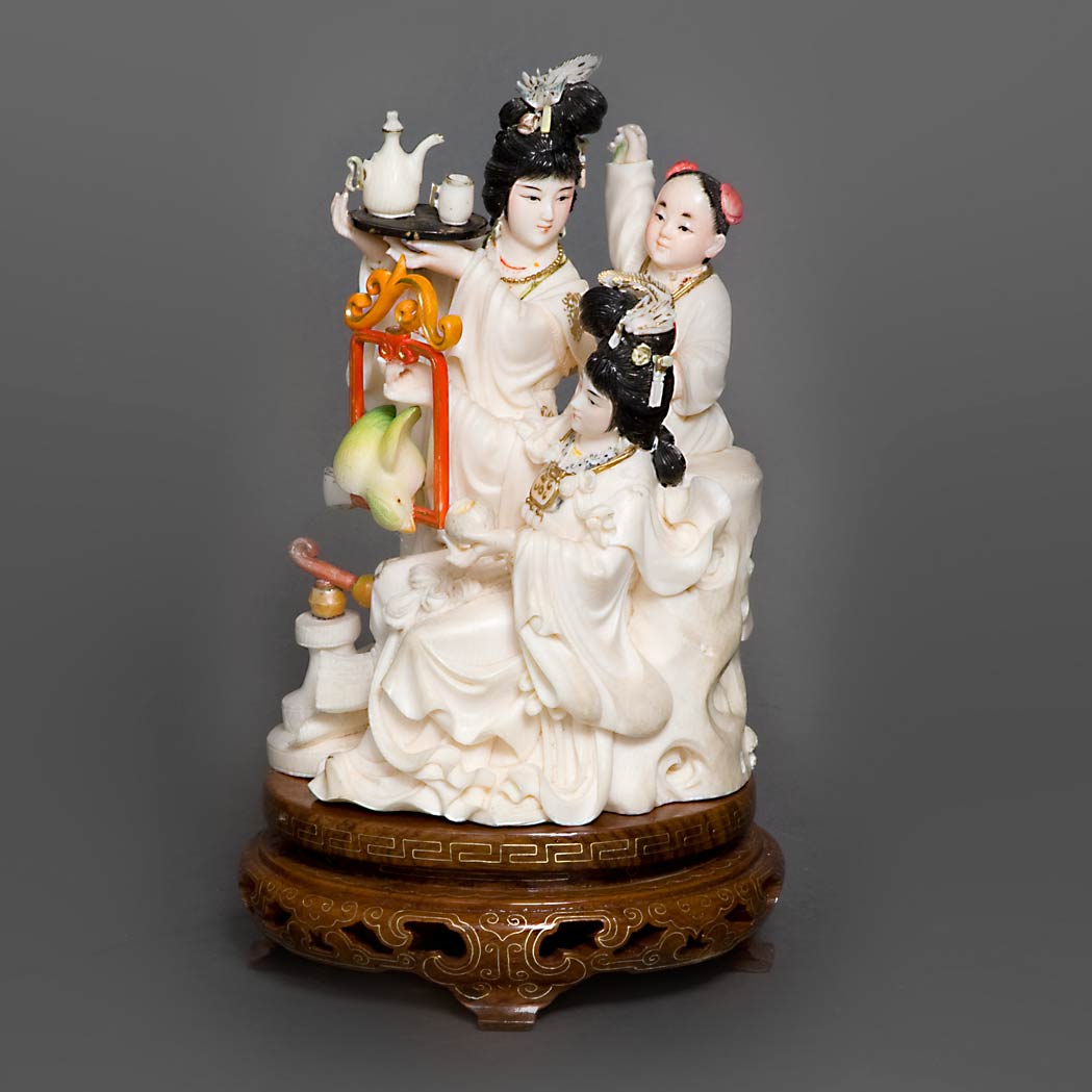 Appraisal: Chinese Polychrome Painted Ivory Figural Group Two women and a