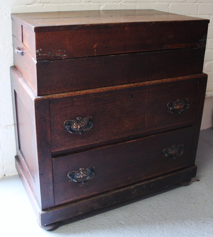 Appraisal: A thC mahogany campaign style chest the upper articulated section