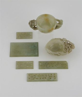 Appraisal: A Chinese jade peach-shaped libation cup carved with a reticulated