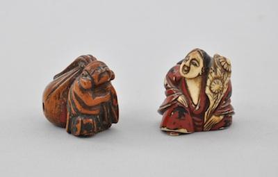 Appraisal: Two Figurative Netsukes First is a carved and lacquered netsuke