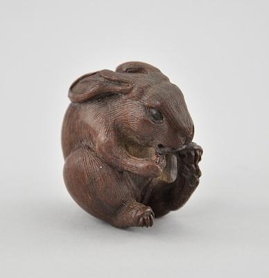 Appraisal: Sitting Rabbit Wood Netsuke Depicting a sitting scared rabbit with