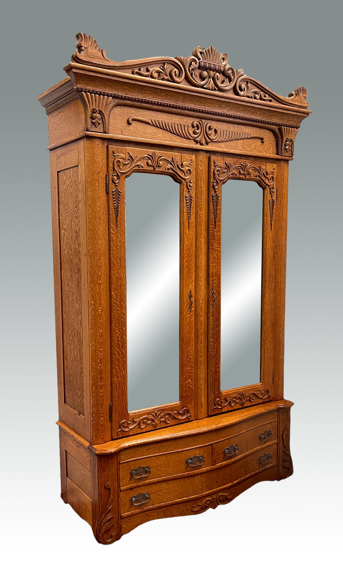 Appraisal: LARGE GOLDEN OAK ARMOIRE W CARVED CREST Golden Oak -