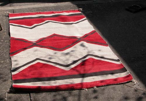 Appraisal: Red Brown and Beige woven rug Wool on Wool th