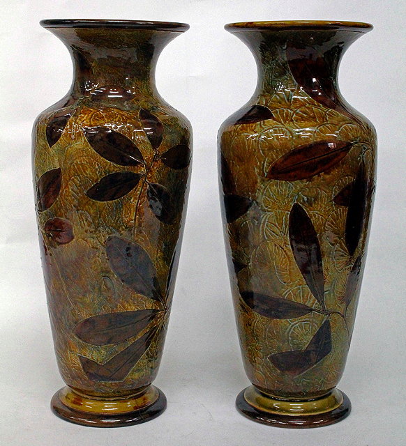 Appraisal: A PAIR OF ROYAL DOULTON VASES decorated with Autumn Leaf